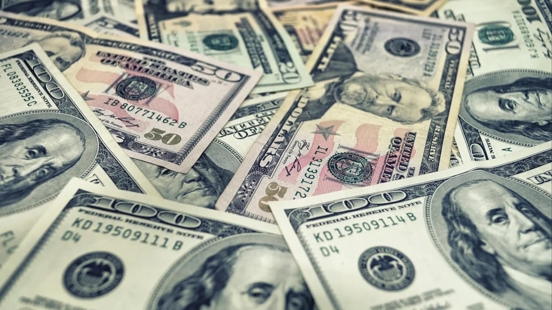 US dollar climbs to 18-month high as Bitcoin holds firm around $86,000